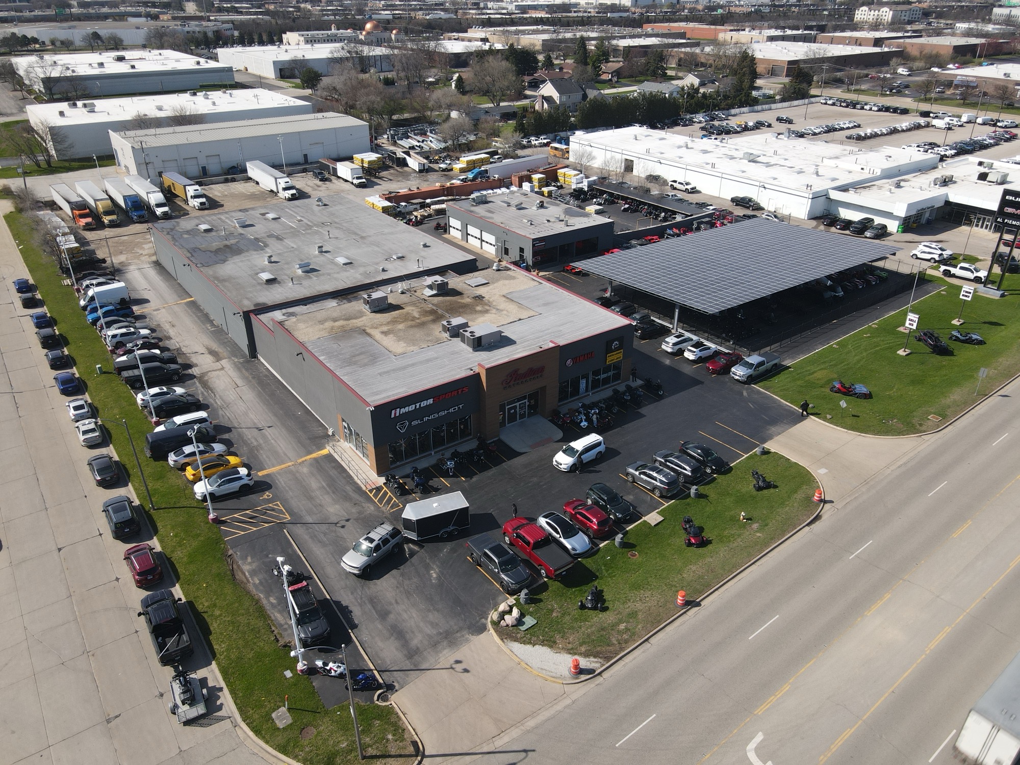 iMotorsports Chicago Elmhurst facility — drone view showing brand signage